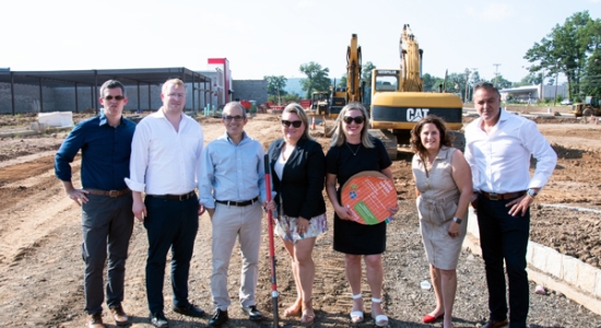 MOMI founders and supporters at site of new Morris Marketplace Community Park